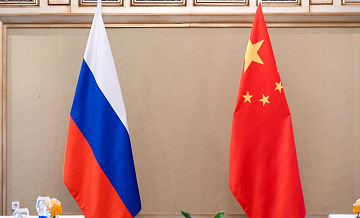 Позиции России и Китая по многим вопросам близки, заявил Ушаков