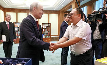 Повторно встретившийся с Путиным китайский инженер считает себя везучим