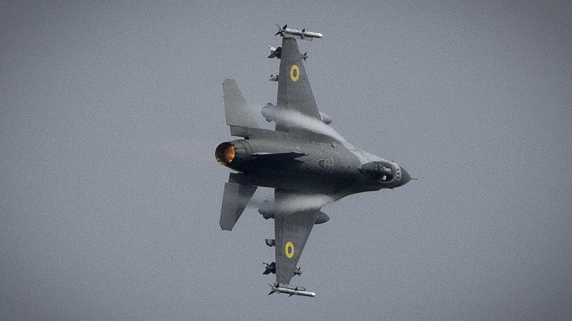  ,         F-16
