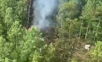 Прокуроры продолжают работу на месте крушения Ан-24