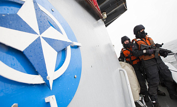 Применение пятой статьи будет означать конец НАТО, считает политолог